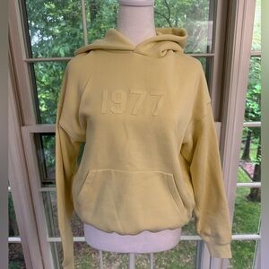 Yellow Essentials fear of God hoodie